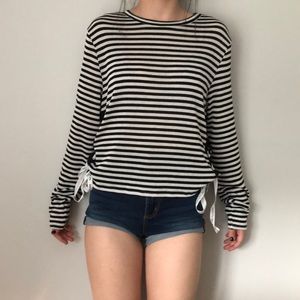 long sleeve stripped “we are the futur” shirt